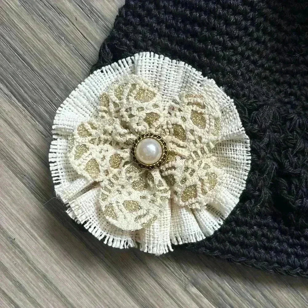 Hand crafted black crochet girls hat with flower and fuzzy pom pom - Picture 3 of 9